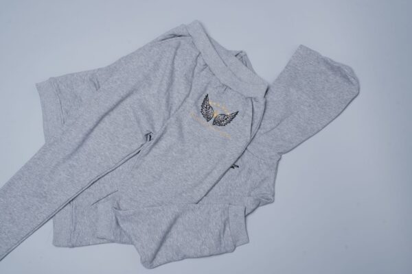 A grey 100% cotton unisex kids hoodie with an embroidered eagle on it in size 3T (3 year old) and 7T (7 years old).